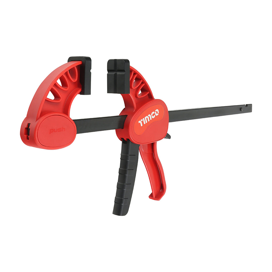 A heavy duty single handed bar clamp and spreading tool with a maximum grip capacity of 135kg. Featuring super soft grip handles for comfortable use and a quick release ratcheting mechanism for added convenience. Ideal for assisting the support of materials during heavy gluing and clamping applications. With non-marking full face pads to distribute pressure evenly to reduce the risk of damage to the workpiece.